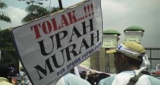 Solusi soal upah, bukan...