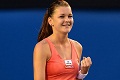 Radwanska melaju ke...