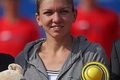 Halep rebut trofi pertama