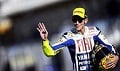 Rossi girang duduk podium...