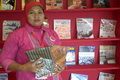 Perpustakaan mengantarkan...