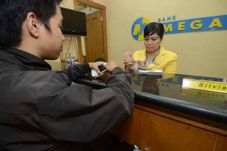 Bank Mega targetkan...