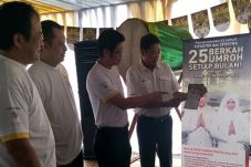 Hadiah umroh FIF aman...