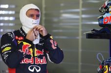 Vettel Iri Dengan Mobil...