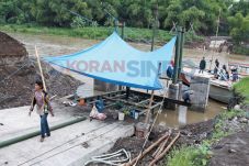 Padukan Sungai dengan...