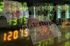 Rupiah Dibayangi Gejolak...