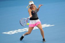 Wozniacki Terancam Absen...