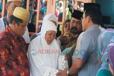Istri Aiptu Onang Lubis...