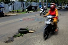 Perbaikan Jalan Berlubang...