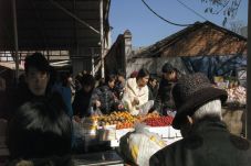 Inflasi China Naik Menjadi...
