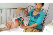 Bocah Pemakan Batu Bata...