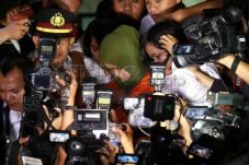 Ditahan KPK, Evi Susanti...