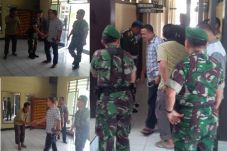 Anggota TNI dan Polri...