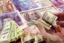 Rupiah Menguat Atas...