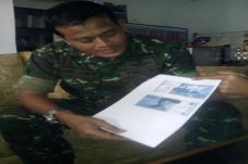 Uang Rupiah dengan Coretan...