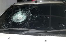 Pelemparan Kaca Mobil...