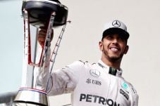 Wins US Grand Prix,...
