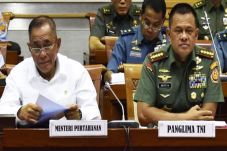 With Minister of Defense...