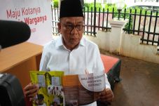 Penyebar Brosur Kampanye...