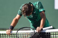 Federer Tetap Menjadi...