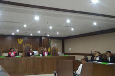Korupsi, Andi Taufan...
