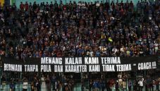 Aremania Desak Aji Santoso...