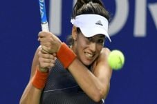 Muguruza Melaju ke Babak...