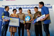 XL Axiata Tuntaskan...