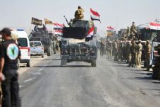 Pasukan Irak Rebut Kota...
