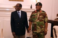 Mugabe Bertemu dengan...