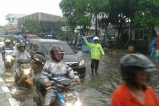Diguyur Hujan Dua Jam,...