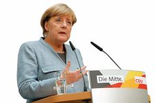 Merkel Optimistis Bangun...