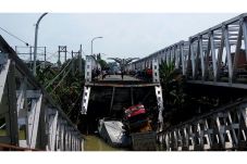 Jembatan Penghubung...