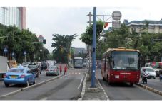Dilintasi Obor Asian...