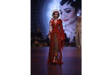 Vera Anggraini Merancang...