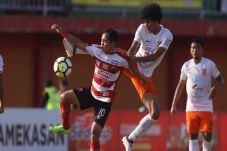 Madura United Telan...