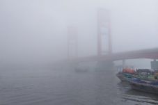 Palembang Diselimuti...