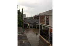 Diguyur Hujan, Tangerang...