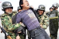 China Ancam Balas AS...