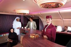 Penumpang Qatar Airways...