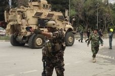 Tiga Tentara AS dan...