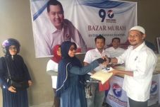 Warga Kobar Serbu Bazar...