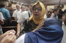 Divonis 8 Tahun Bui,...