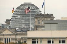 German Lawmakers Urge...