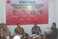 Polemik Revisi UU KPK,...
