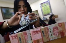 Rupiah Pulih Karena...