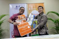 Indosat dan WOM Finance...