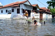 Diguyur Hujan Dua Jam,...