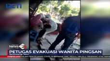 Petugas Evakuasi Wanita...