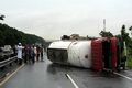 Truk semen terguling di Tol Cempaka Putih